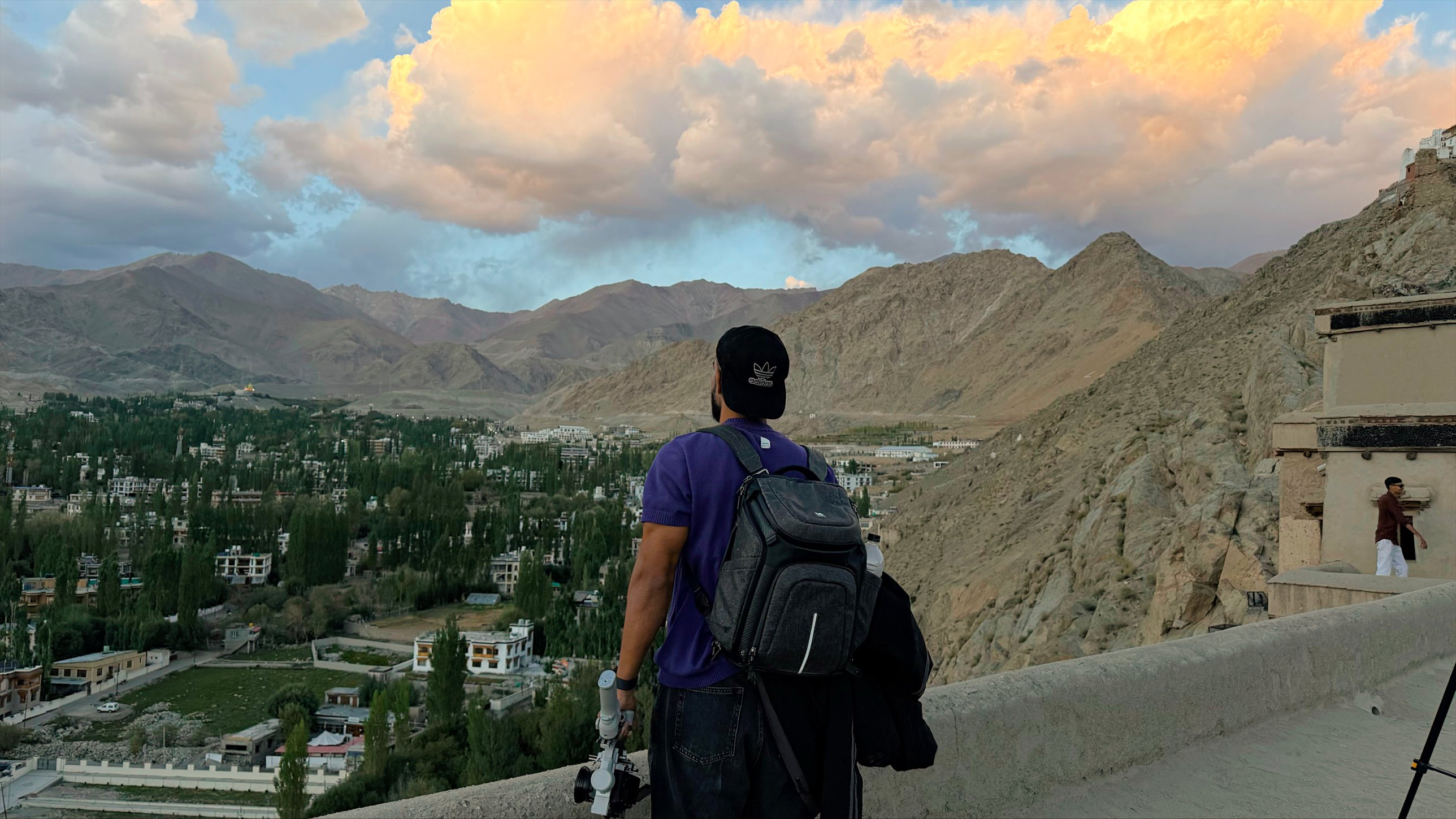 Saifarnama's founder looking over Leh, Ladakh at sunset