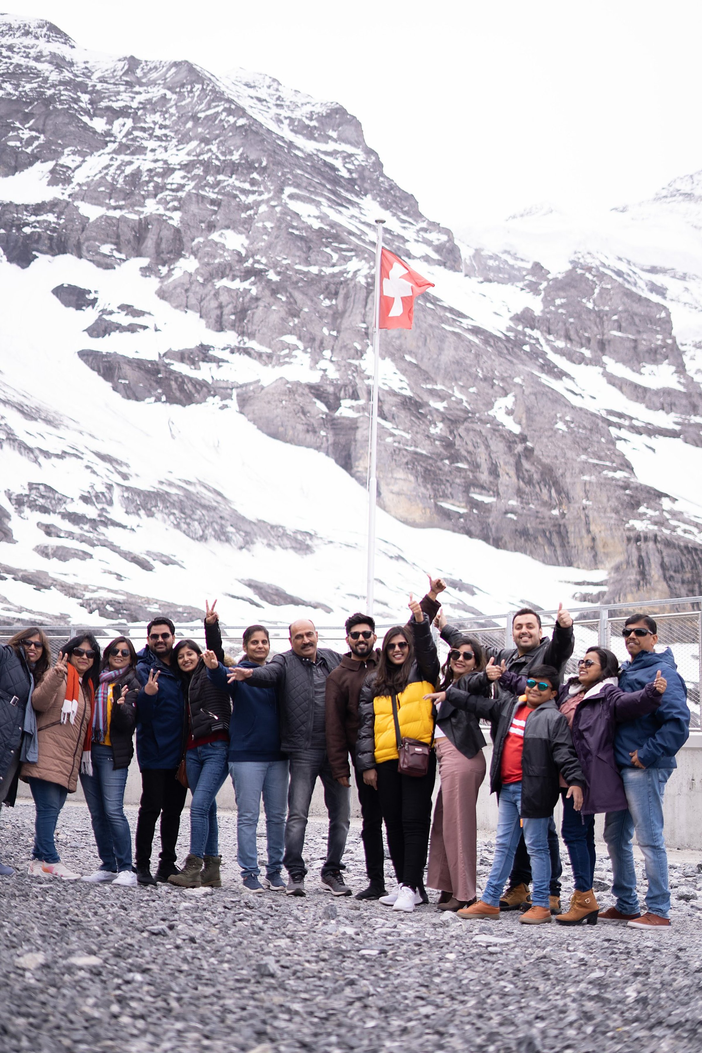 A Saifarnama group in the snow below the Eiger, Switzerland