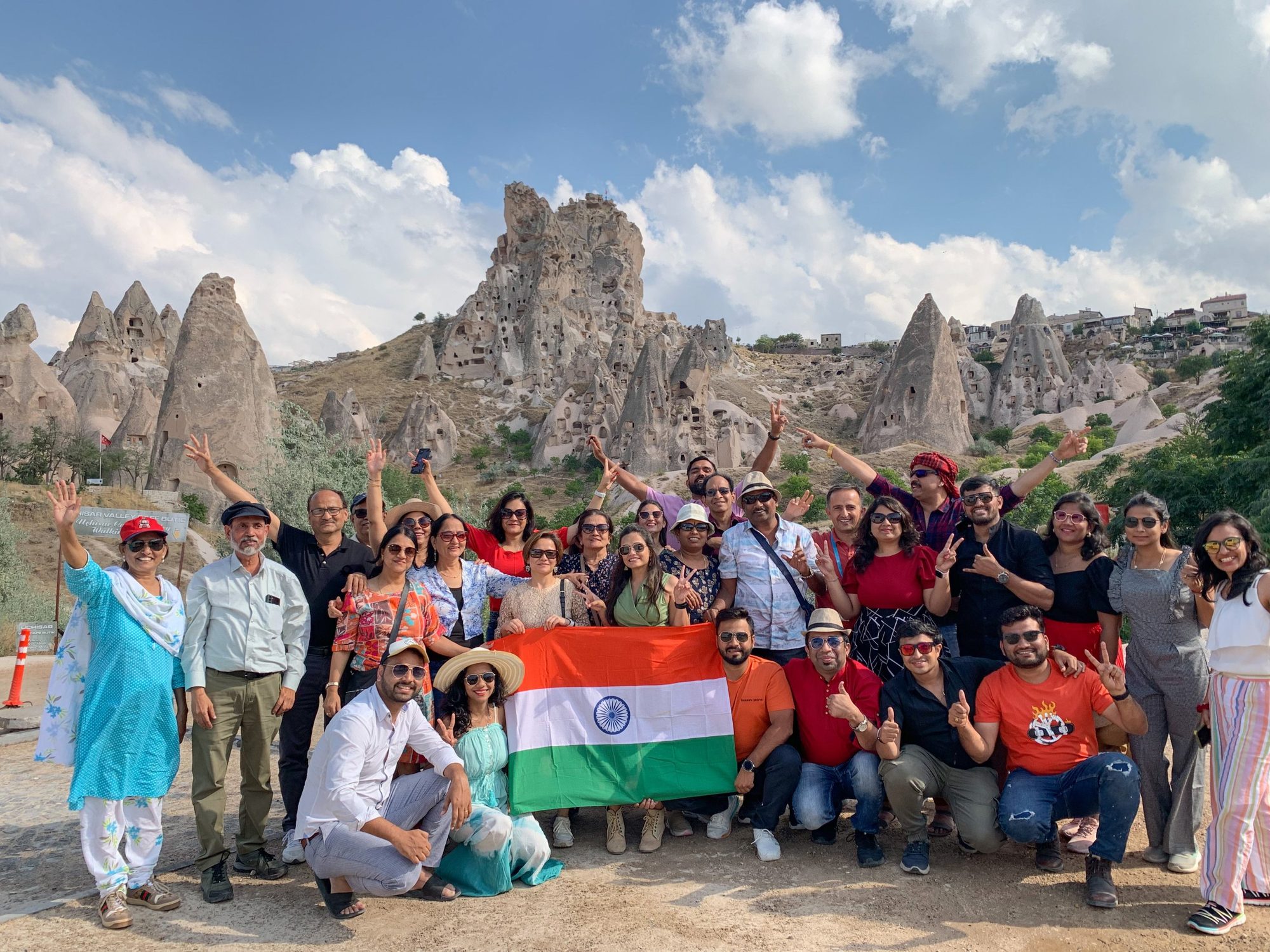 A Saifarnama group with the Indian flag in Uchisar, Cappadocia